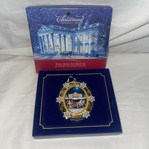 The White House Christmas Ornament 2004 still new in the box with out a tag.